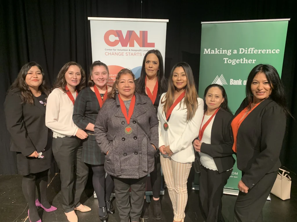 C4DP advocates pose with their medals at a CVNL recognition event honoring their community work supporting survivors in Marin County.