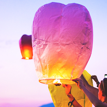 colorful air lanterns being let go into the sky